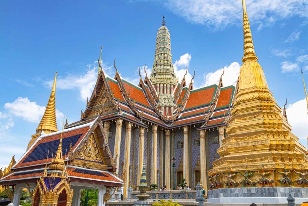View of the Grand Palace and Wat Phra Kaew, showcasing stunning Thai architecture in Bangkok, Thailand. Must- Visit Temples in Bangkok. Top 20 Best Things to Do in Bangkok.