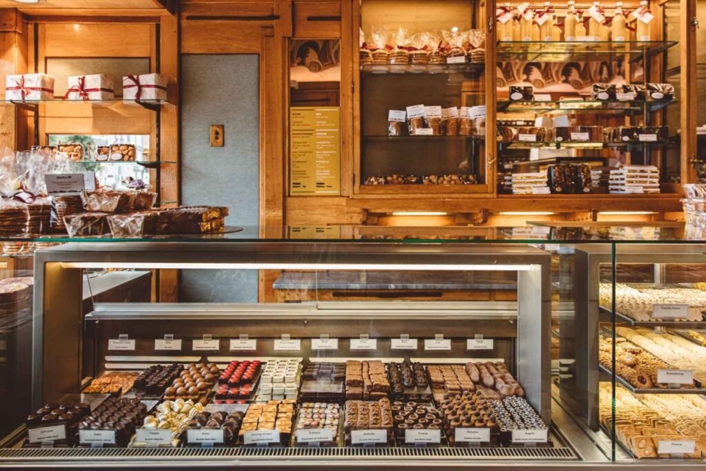 A vibrant display of various pastries and cakes at Patisserie Holtkamp in Amsterdam, showcasing delightful baked goods. Best Bakeries in Amsterdam.