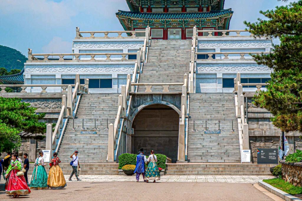 Gyeongbokgung Palace in Seoul, South-Korea V2 - Yati Travel Visitors stroll past Gyeongbokgung Palace in Seoul, South Korea, highlighting the blend of culture and history. South-Korea Travel Guide.
