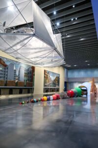 A spacious room under a large white canopy, located inside the Centre Pompidou in Málaga, Spain. Best Things to Do in Málaga.