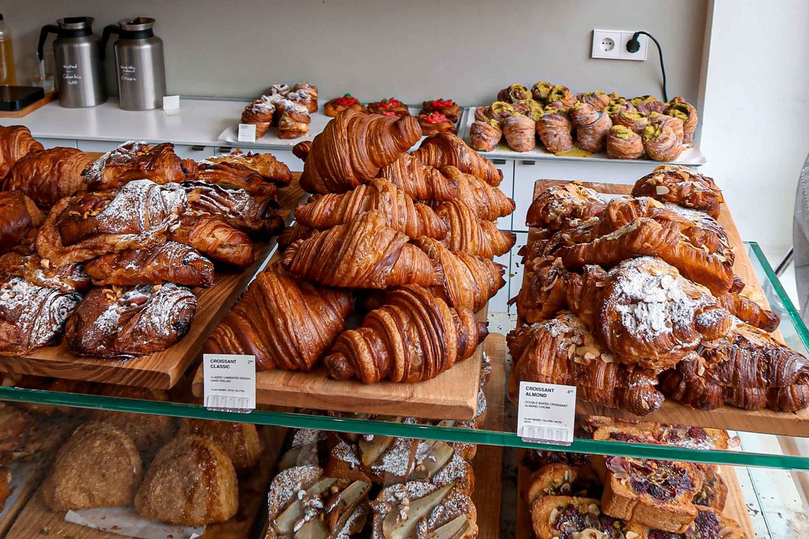 A tempting display of pastries, including a pistachio cruffin, at Saint-Jean Bakery in Amsterdam. Best Bakeries in Amsterdam.